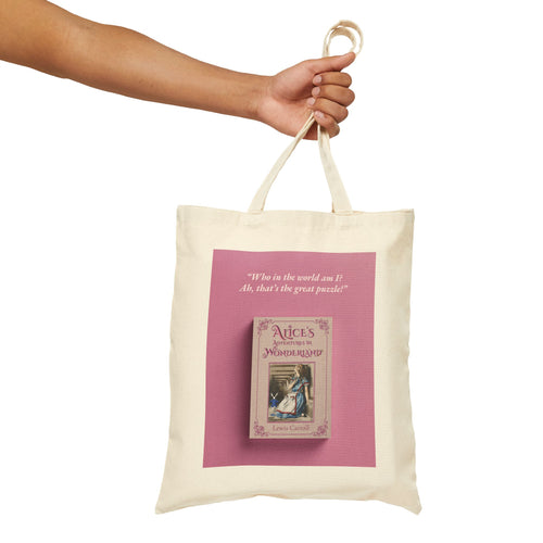 Alice's Adventures in Wonderland Tote Bag — mockup with hand holding the bag